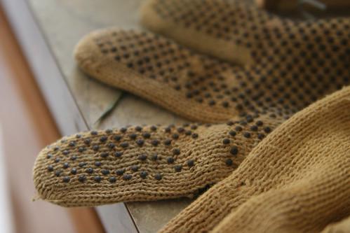 Hands wearing a pair of well-fitting, breathable gardening gloves, looking comfortable and ready for extended gardening sessions